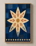 The Star Flower celestial folk art canvas in a natural wood floater frame, seen from the front