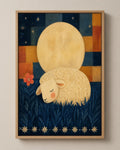 The Sleeping Lamb folk art canvas in a natural wood floater frame, seen from the front