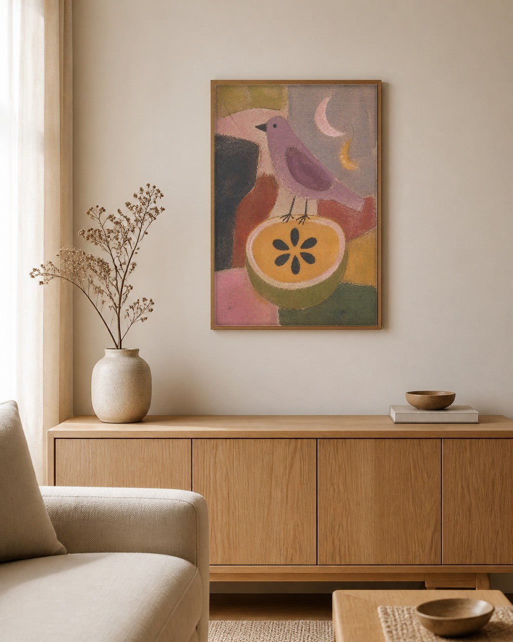 The Bird and the Cut Fruit framed canvas hanging above a sideboard in a calm living room