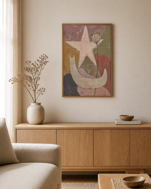 The Cat and the Seed Head framed canvas hanging above a sideboard in a calm living room