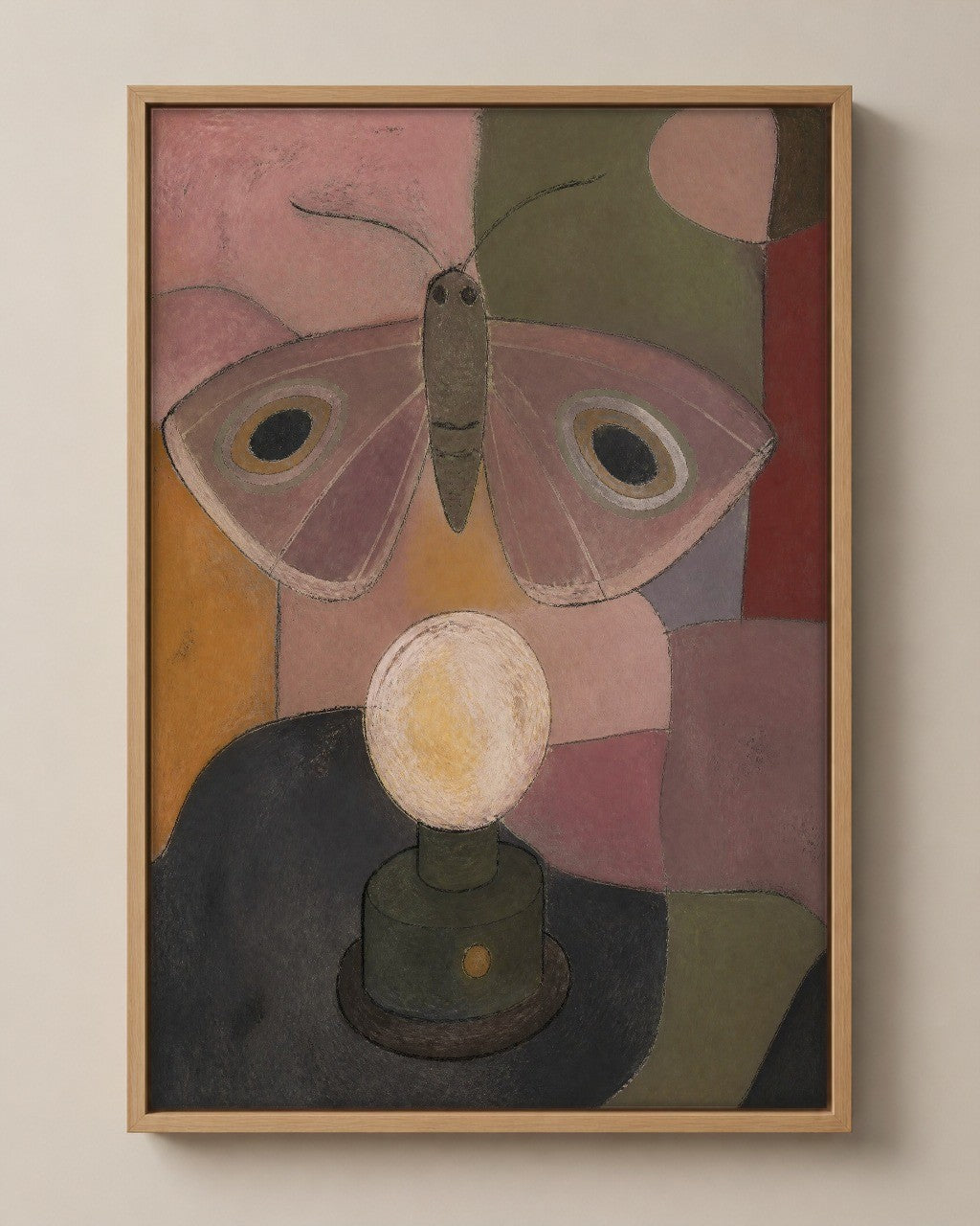 The Moth and the Lamp muted folk art canvas in a natural wood floater frame, seen from the front