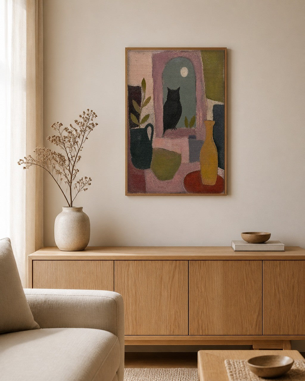 The Owl in the Window framed canvas hanging above a sideboard in a calm living room